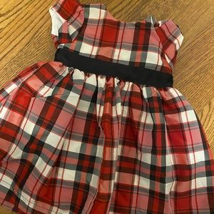 Red, white, and black plaid dress with bow